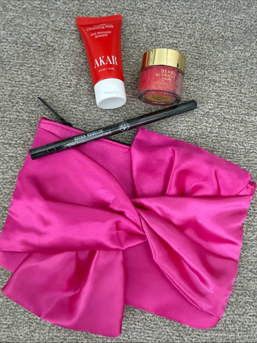 ipsy Hot Pink Satin Makeup Bag with CLEANSING MILK, LIP SCRUB, EYELINER